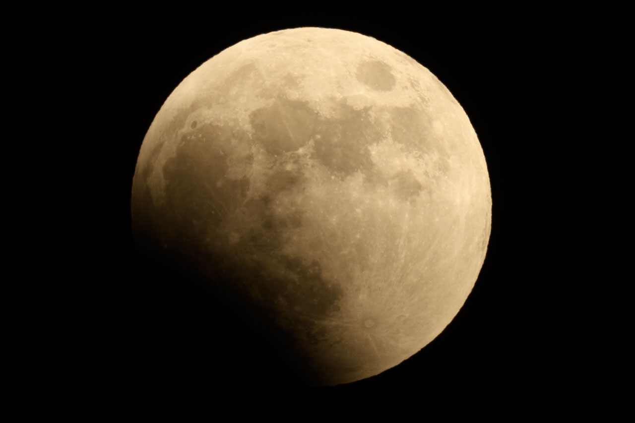 Beginning of the waning of the moon in a total lunar eclipse